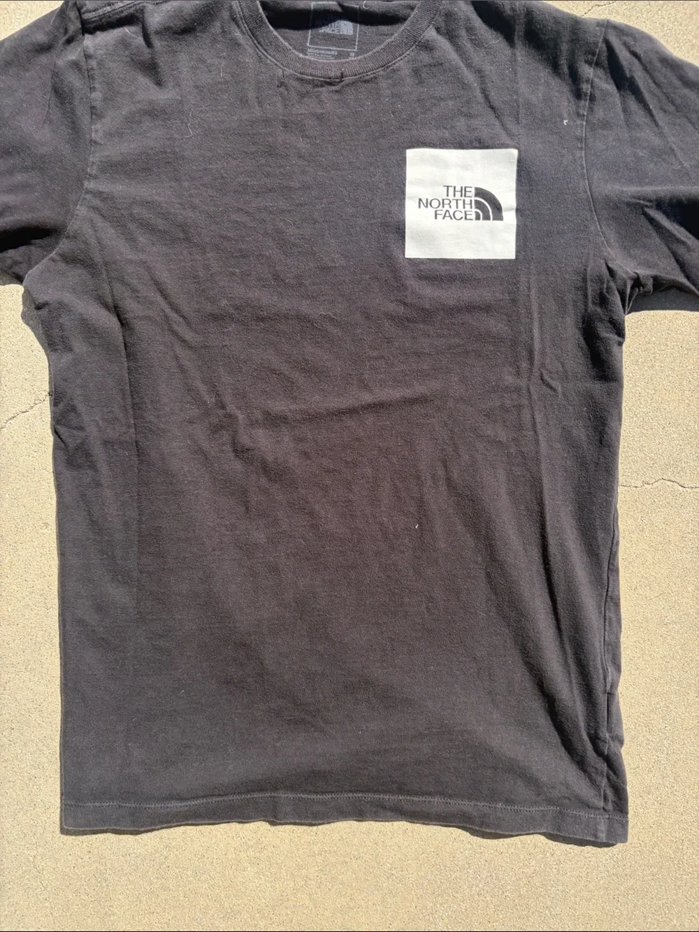 The North Face Men's Black Tee with White Logo Patch